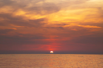 Beautiful sunset beach over the sea