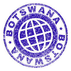 BOTSWANA stamp print with grunge effect. Blue vector rubber seal print of BOTSWANA title with grunge texture. Seal has words placed by circle and globe symbol.