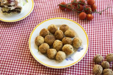 top view of deep fried rissoles in a dish