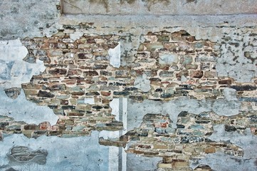 peeling paint over antique bricks, vintage texture