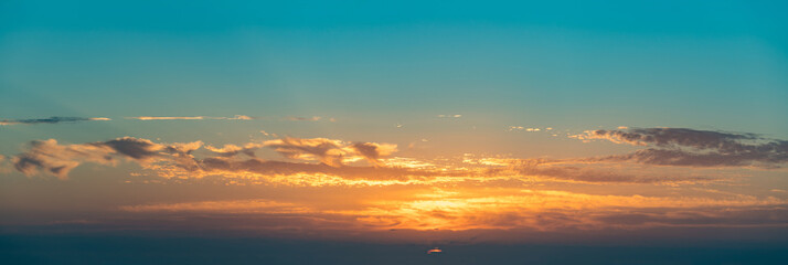Naklejka na ściany i meble Panorama of sky at sunset or sunrise