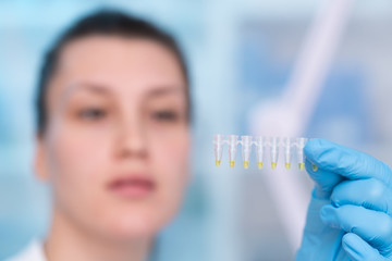 Young woman with genetic research in the laboratory research of cancer diseases