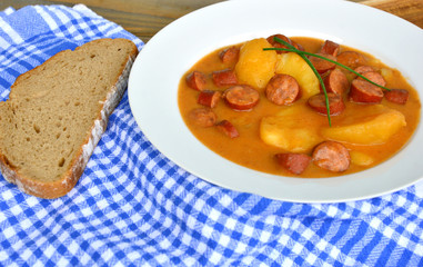Potato Goulash with Sausage (German name is kartoffel wurst gulasch)
European food menu.