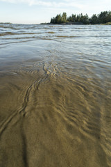 Ripples in Water and Sand in Ocean