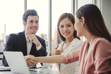 Group of diversity business people making handshake for teamwork and agreement concept, at meeting room in office