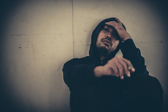 Asian men are drug addicts to inject heroin into their veins themselves.Flakka drug or zombie drug is dangerous life-threatening,Thailand no to drug concept,The bad guy drugs in the desolate