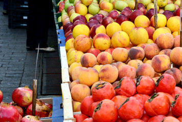 A lot kind of fruits at Athens street market.
 a variety of fresh fruits in the market.