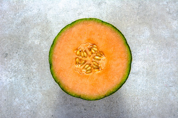 Half of melons, orange cantaloupe melon slice