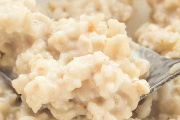 Boiled oat porridge, macro photography