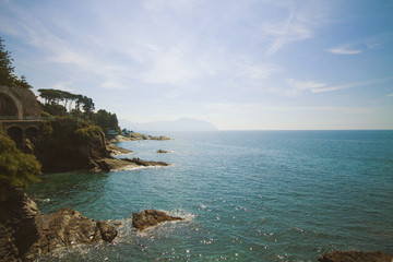 Panoramic view of the Tigullio gulf from the sea promenade  on the rocky coast of Genoa Nervi, Liguria, Italy