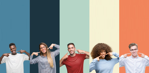 Group of people over vintage colors background smiling confident showing and pointing with fingers...