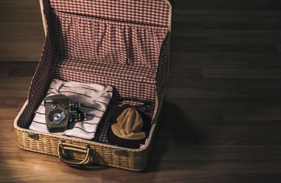 Retro Bag Packing camera Paired with older phones  on wood background
