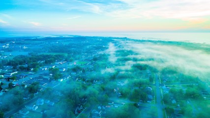 High above the clouds looking down on the city © Derek