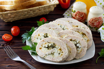 Meat roll (roulade) with egg and greens. Thanksgiving day appetizer.