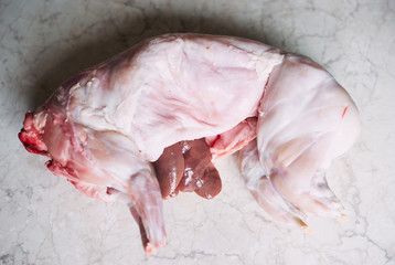 Delicious raw organic fresh rabbit meat in table top view