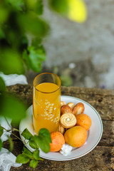 Fototapeta premium juice, apricot, cookies. Close up - sweet food set. food background.