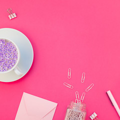 Styled pink feminine workspace flat lay