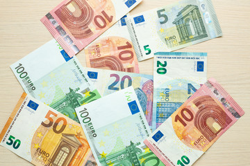 Euro bank notes on the table. Top view