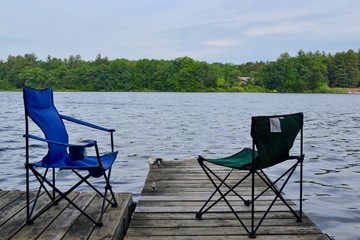 Sitting on the end of a dock in Greenville, Michigan enjoying the view