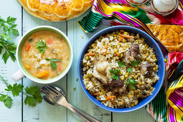 Eastern cuisine. Homemade Soup with bean mung and rice with bean mung and beef. Top view flat lay...