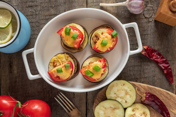 Gratin eggplant with minced meat, tomatoes and cheese.