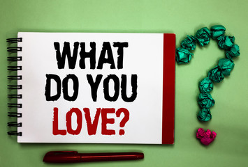 Writing note showing What Do You Love question. Business photo showcasing Enjoyable things passion for something inspiration Celadon color background red sided notepad letters green query mark.