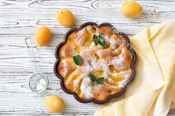 Apricot homemade cake and fresh apricots