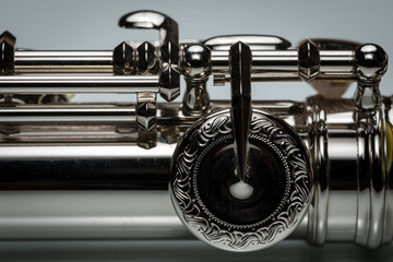 Engraved keys of a platinum plated silver flute