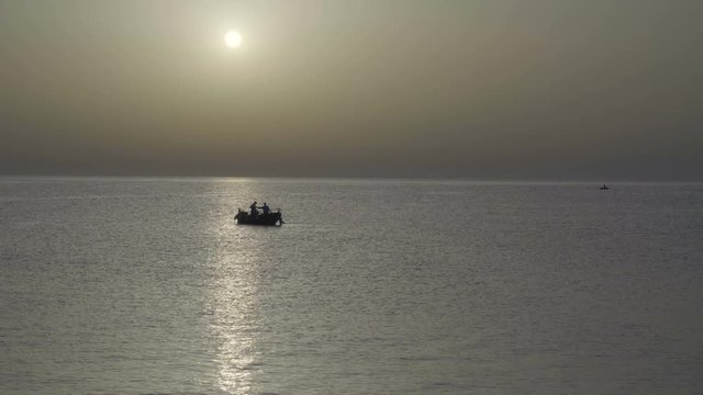 Fisherman on Fishing boat, sunset, sunrise