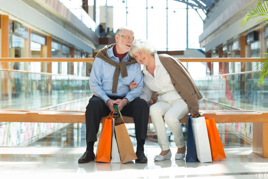 Senior couple in shopping mall