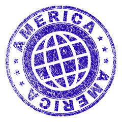 AMERICA stamp print with distress style. Blue vector rubber seal print of AMERICA text with grunge texture. Seal has words arranged by circle and planet symbol.