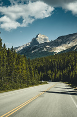Empty Icefields Parkway Street with Mountain Panorama in Banff N