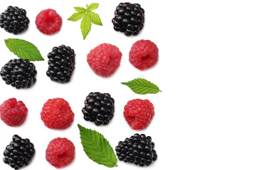 healthy background. raspberry with blackberry and green leaves isolated on white background. top view
