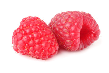 ripe raspberries isolated on white background macro
