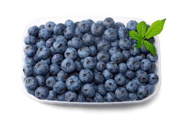 healthy background. blueberries with leaves isolated on white background .