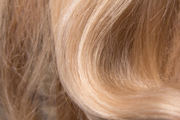 Naklejka premium Beautiful Hair. background. Beauty Healthy blond Hair. shiny straight hair. Hairstyle. Hair cosmetics. Damage hair Health of hair