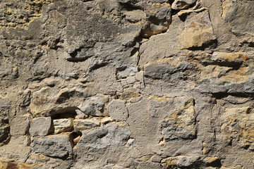 Texture of very old stone wall