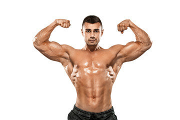 Brutal strong muscular bodybuilder athletic man pumping up muscles on white background. Workout...