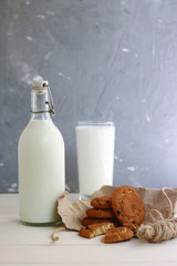 cookies with milk. horizontal view with glass of milk and cookies with bow