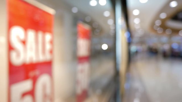 discount sign advertisement sale 50% price promotion in shopping store