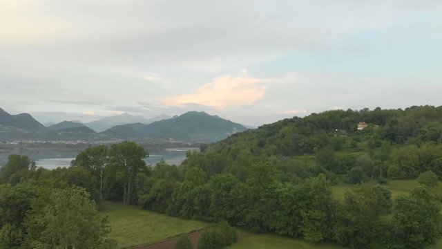 Aerial Landscape seen by Drone of Vegetation and Mountains by the Alserio Lake in Italy