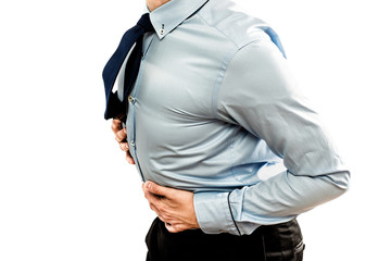 Stomach ache, medical and healthcare concept. Man holds his hands on stomach because of pain....
