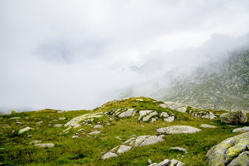 A mountain wasteland with stones in the clouds
