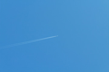 Passenger airplane flying in the sky. View diagonally. Background. Texture.