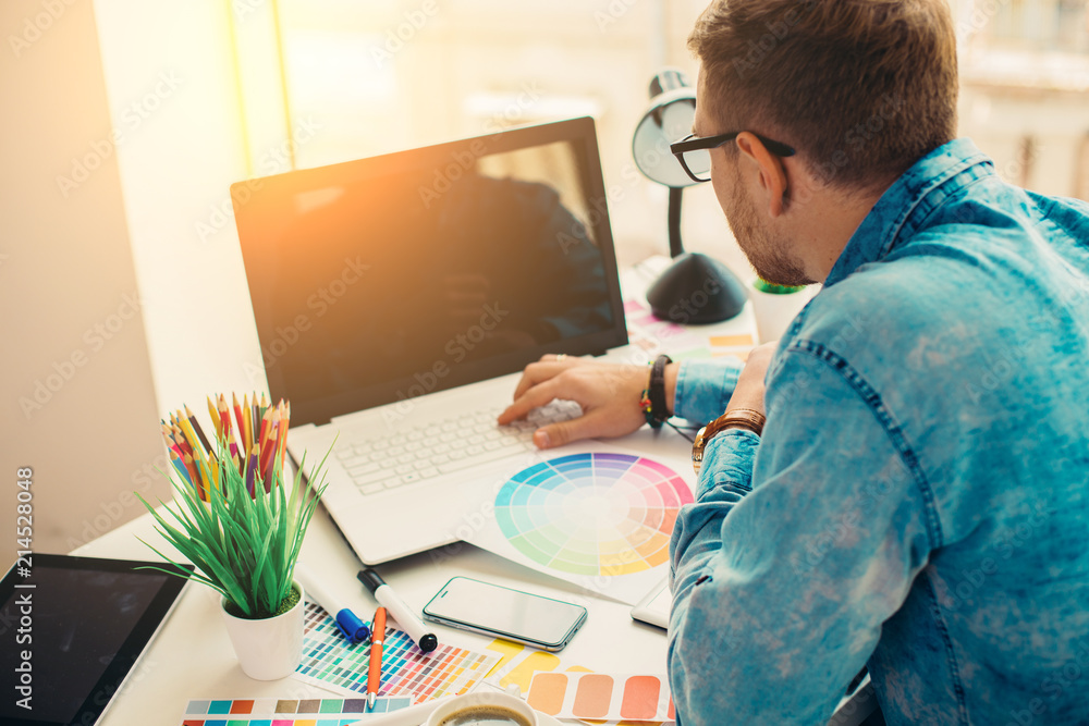 Poster web designer working on the best framework of a new application