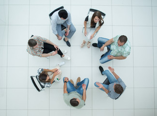 top view.boss and business team pointing at you