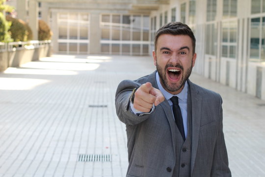 Excited Man Laughing And Pointing At Camera 