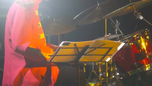 Drummer Musician Playing at a Concert at Night