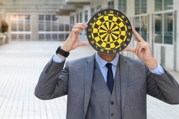 Businessman holding shooting ring in the office 