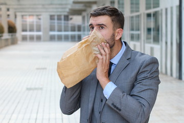 Businessman having a panic attack